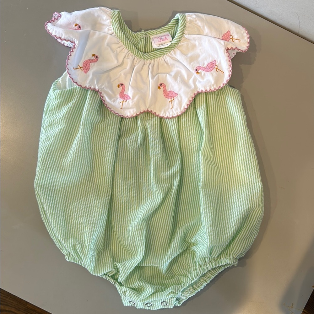 Stitchy Fish green and white seersucker bubble with embroidered flamingos.